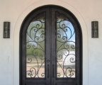 IDG1912-Granada_Round_Top_Double_Iron_Door_with_Raised_Panels