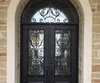 IDG1912-Milan_with_Raised_Panel_Double_Iron_Door_with_Round_Top_Transom