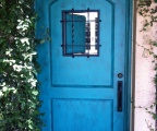 IDG1912-2_Panel_Iron_Door_with_Speakeasy_and_Custom_Turquoise_Finish-rs